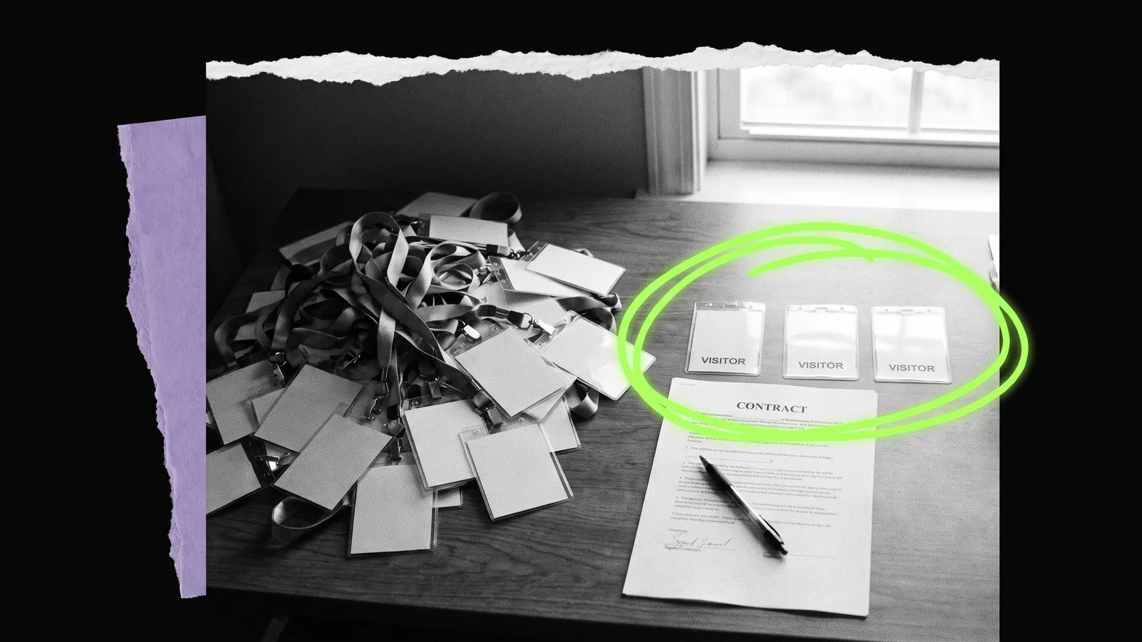 Black-and-white photo of a desk after an event: a heap of visitor badges and lanyards on the left, and three badges laid beside a signed contract with a pen on the right, circled in green.