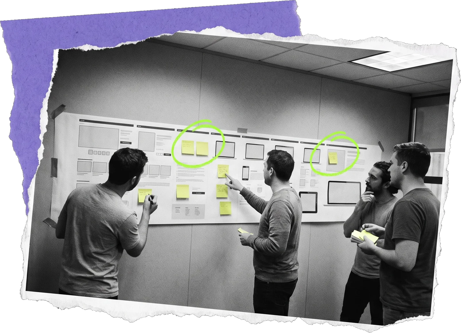 Black-and-white photo of four colleagues at a wall covered with printed pages and sticky notes; two notes are circled in green.