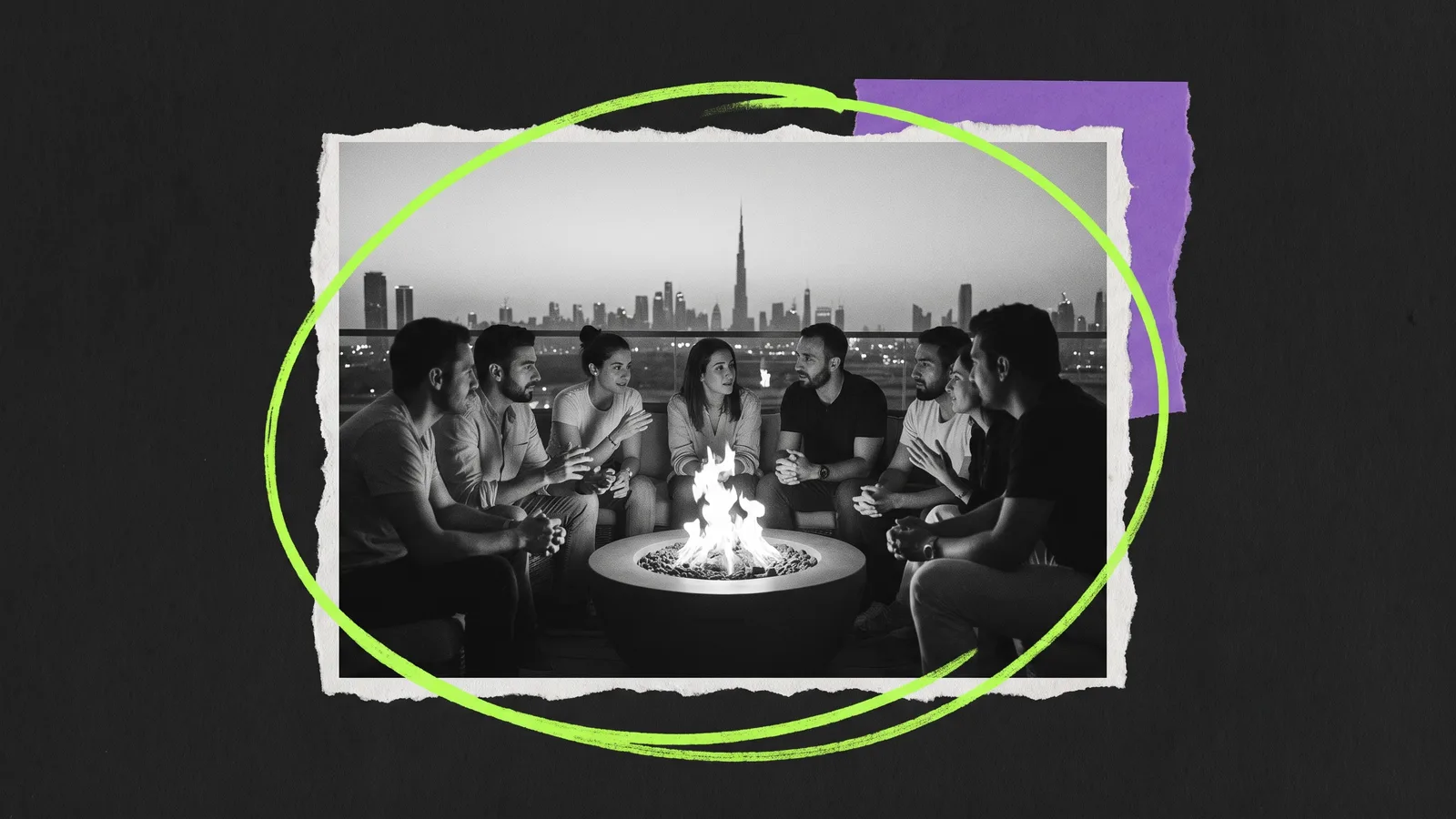 Black-and-white photo of a small group talking around a fire pit on a rooftop at night, the Dubai skyline behind them, circled in green.