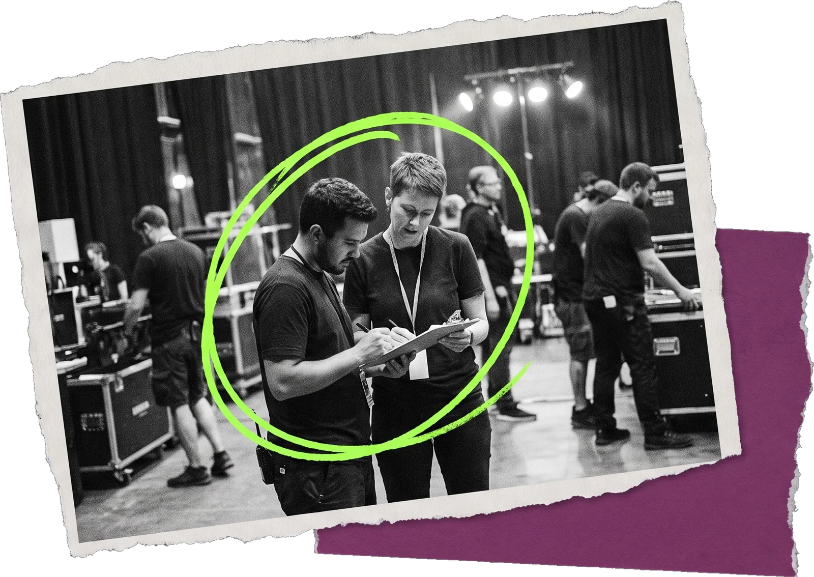 Black-and-white photo of two event crew members reading from a clipboard on a stage among equipment cases; the pair is circled in green.